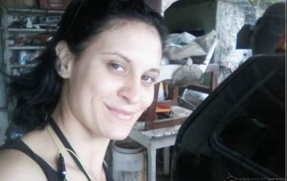 Suspeita de matar vizinha após post se entrega à polícia